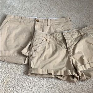 TWO pairs of khaki shorts